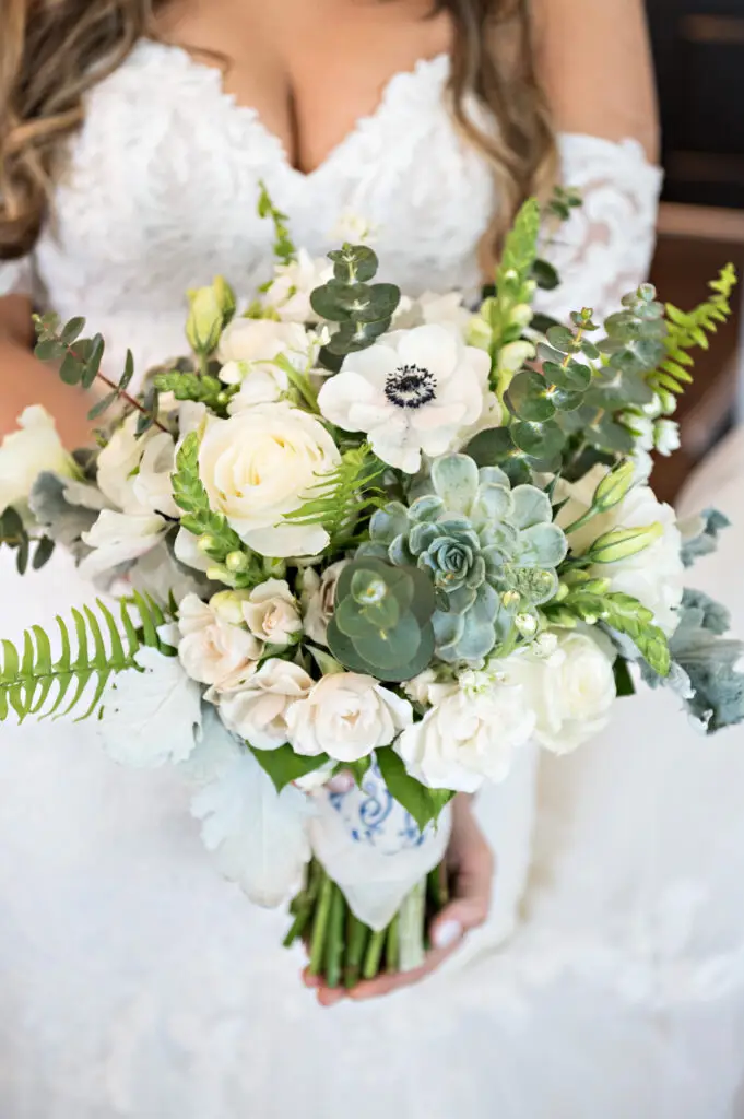 Ballroom reception with layered floral tablescapes