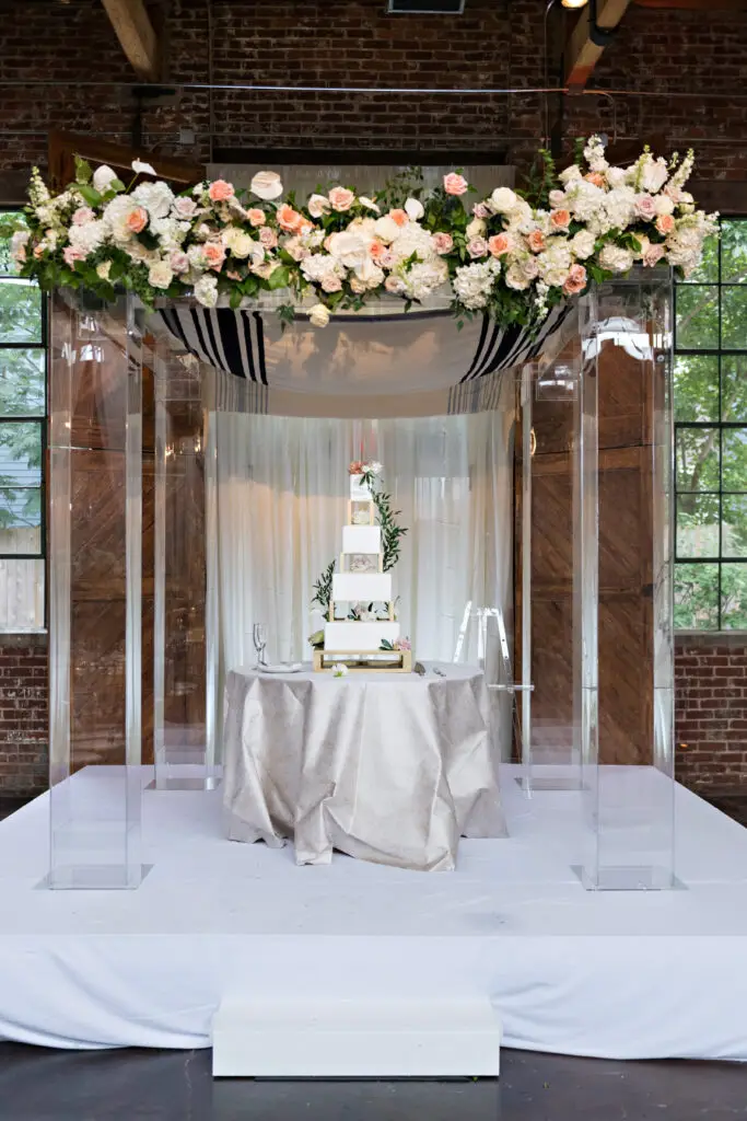 Detail of a suspended floral installation and place setting