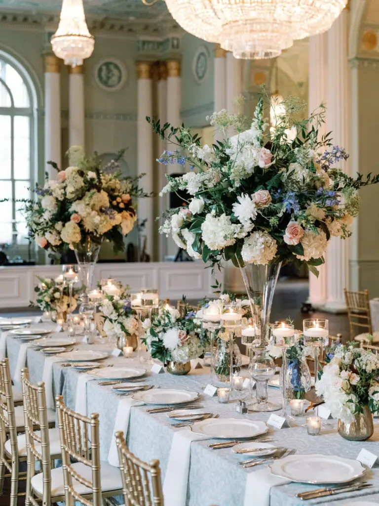 Reception detail with candlelight and layered florals